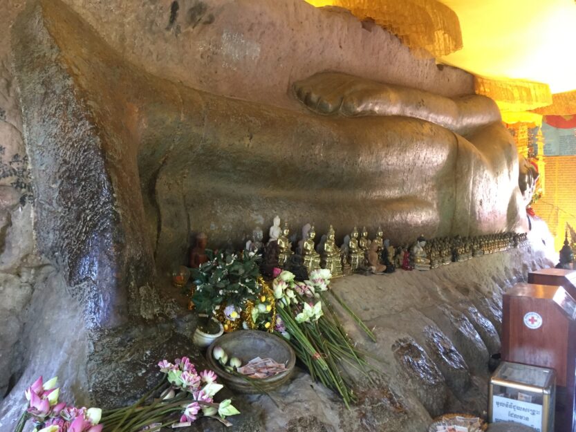 Reclining Buddha on Kulen Mountain in Cambodia Reclining gold buddha at Kulen Mountain National Park