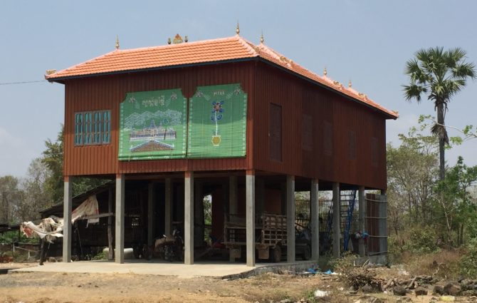 House with colourful, painted wooden blinds, Cheung Kok Ecotourism Village, Cambodia