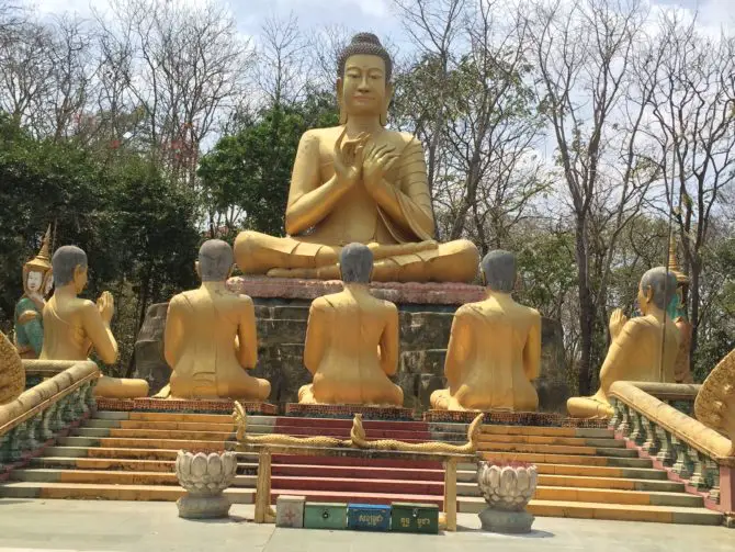 Gold Buddhas at the Chinese Wat between Phnom Pros and Phnom Srey, Cambodia