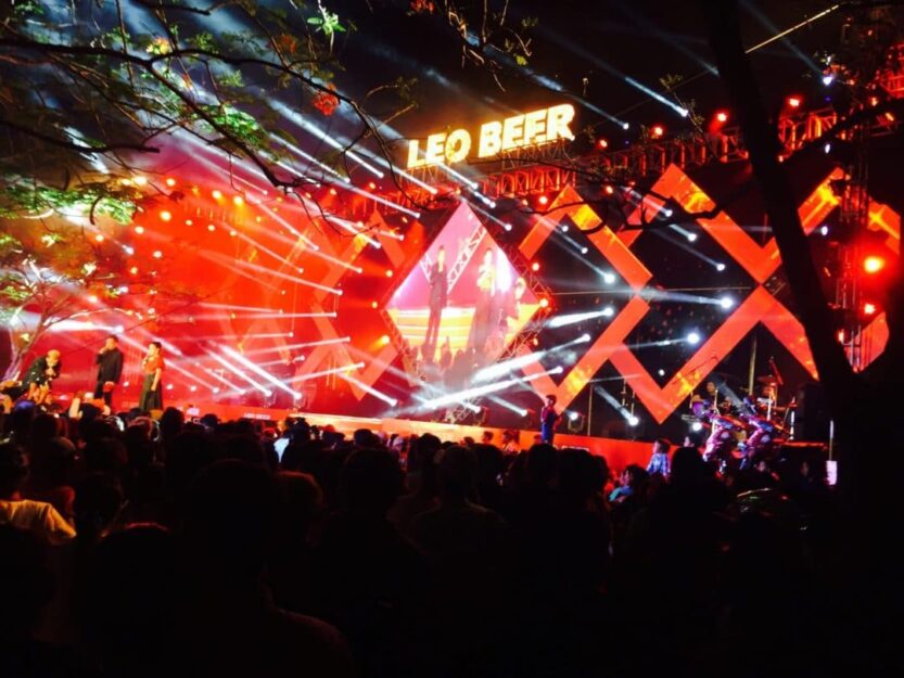 Bright red lights on Royal Gardens concert stage during Khmer New Year in Siem Reap