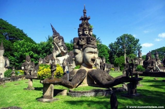 Four headed Buddha statue in Buddha Park in Vientiane, Laos