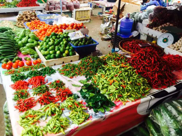 Luang Namtha morning Market, Laos - piles of colourful chillies