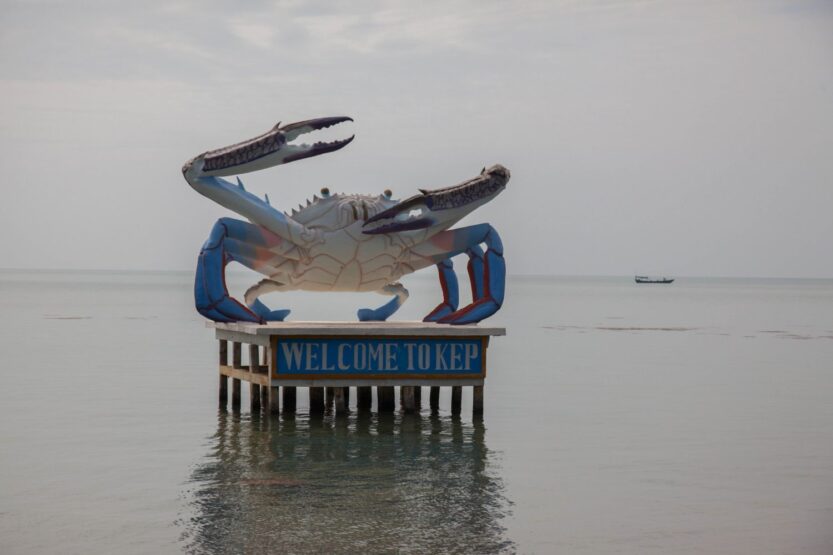 Kep Crab Statue in Kep standing in the sea, Cambodia