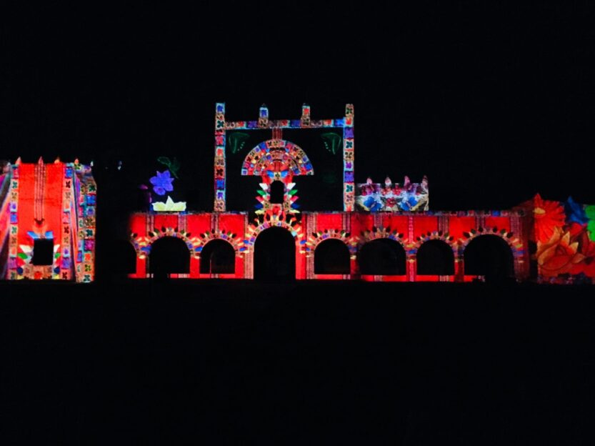 Covento de Bernadino Sound and Light Show in Valladolid, Mexico Colourful lights projected onto the stone walls.