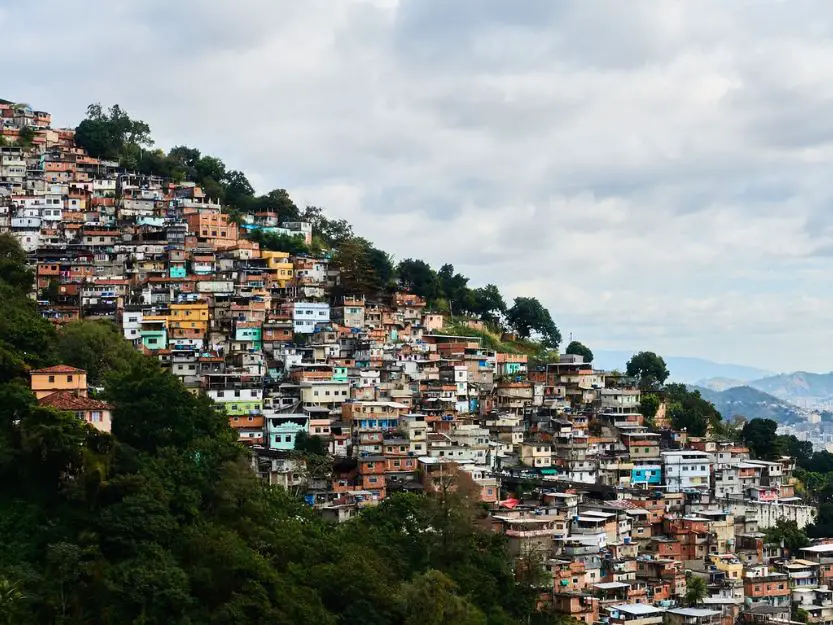 Favela in Brazil with colourful buildings on hillside