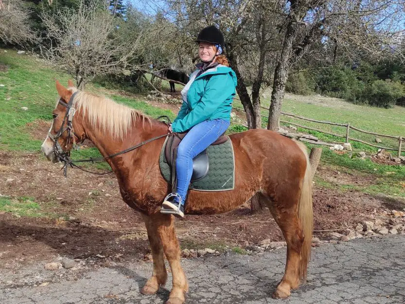Tanya horse riding in Elati pine forest in Greece