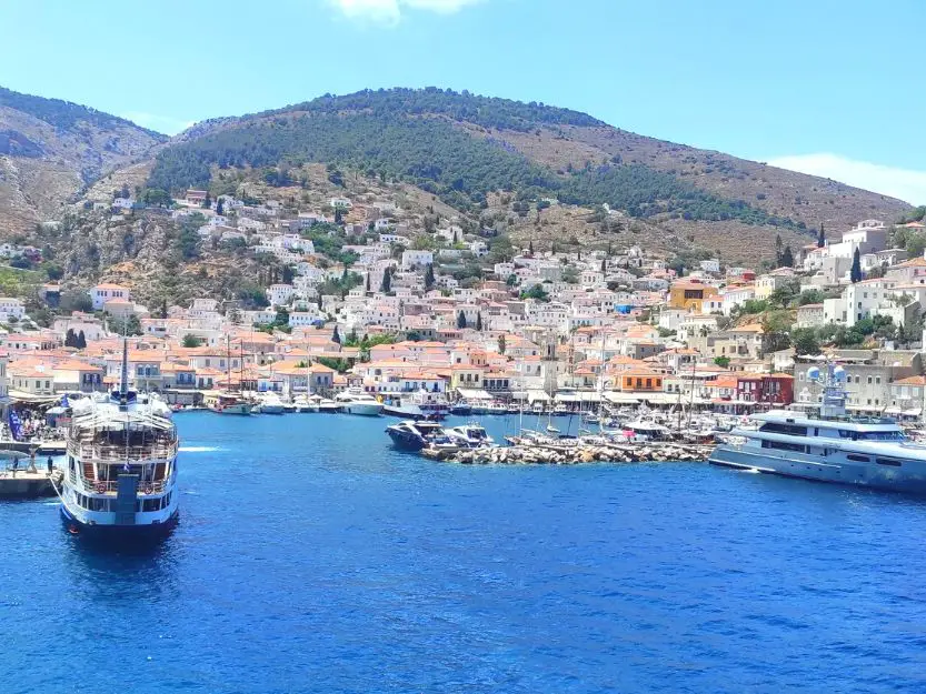 The harbour on Hydra Island, full of boats and yachts.