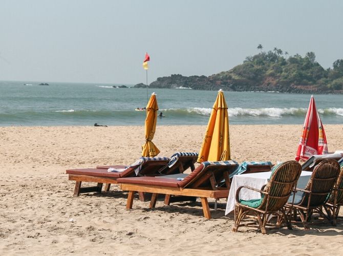 Patnem Beach in South Goa Patnem Beach in South Goa. Sunbeds and parasols on the beach.