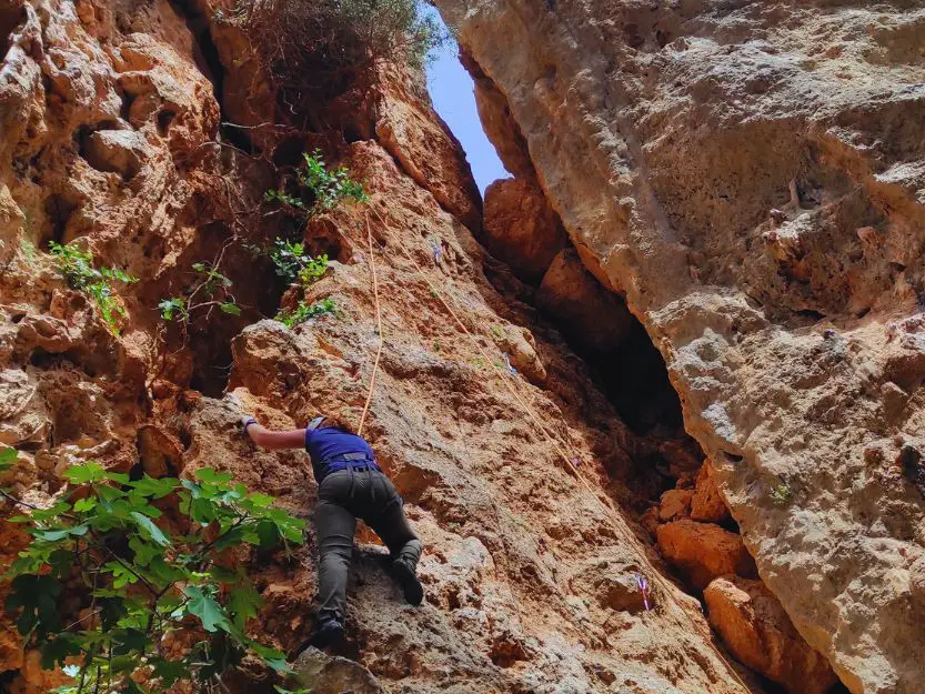 Tanya rock-climbing at Sabaton Sector near Leonidio in Peloponnese, Greece