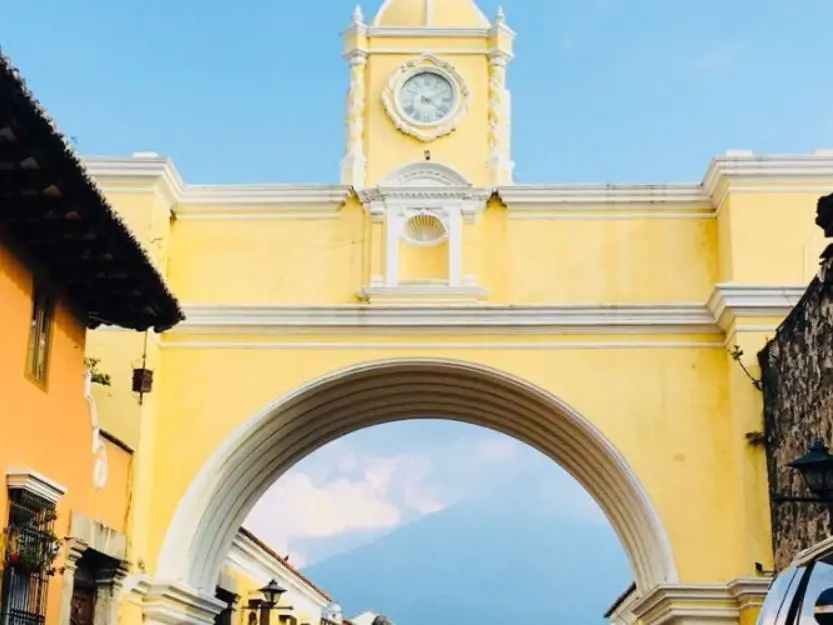 Yellow and white Santa Catalina Arch in Antigua, Guatemala