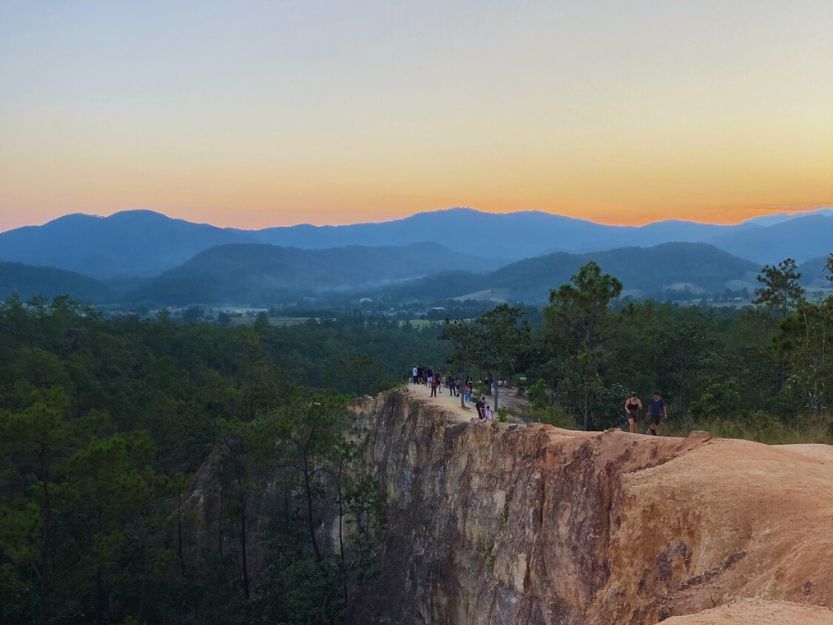 Orange and pink sunset at Pai Canyon in Thailand