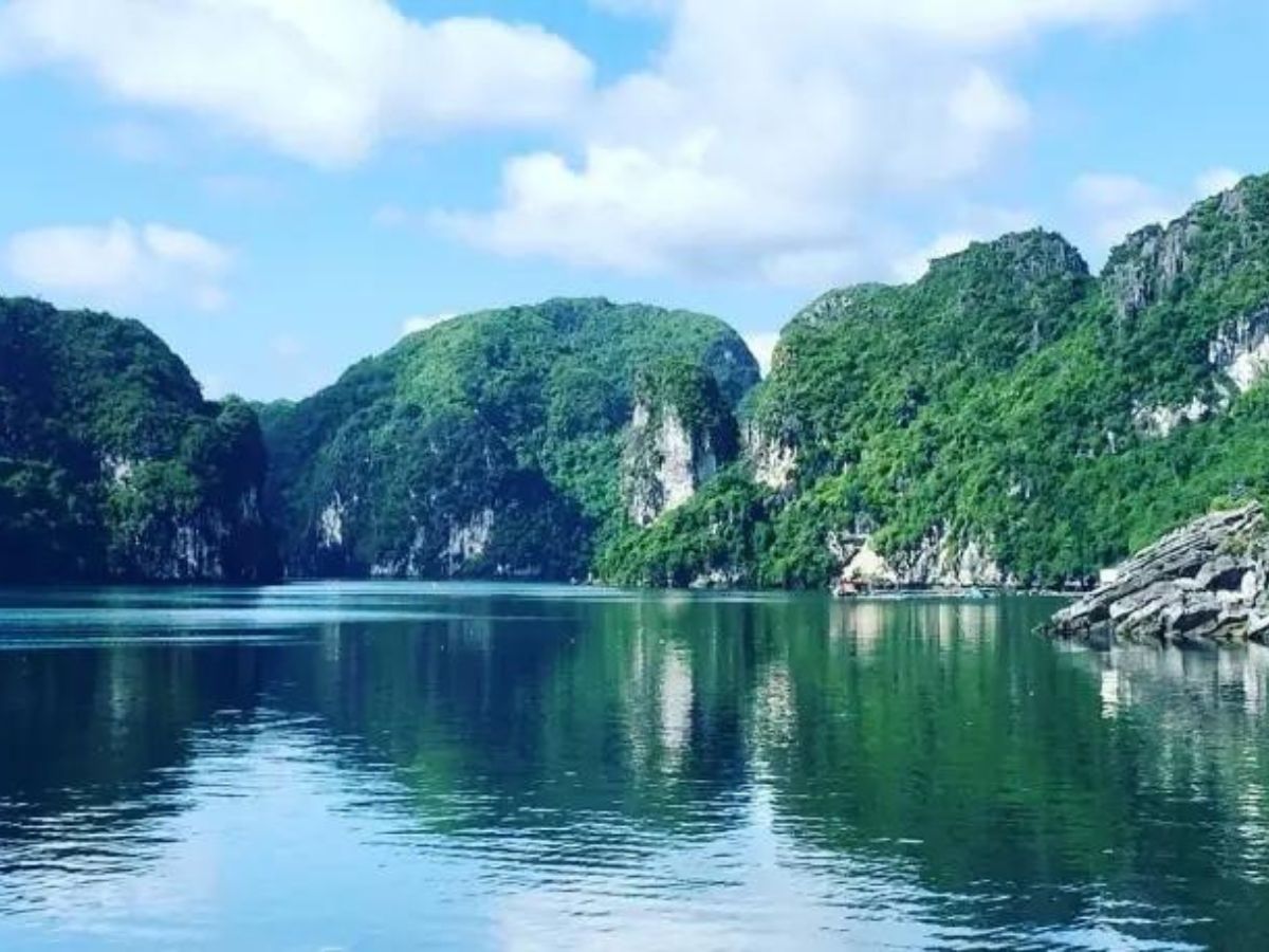 Untouristy Halong Bay Tour from Cat Ba Island, image of limestone casts emerging from the sea.