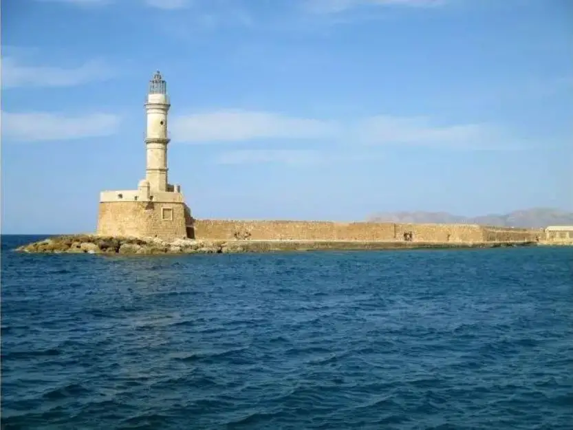 Venetian Lighthouse in the harbour in Chania, Crete