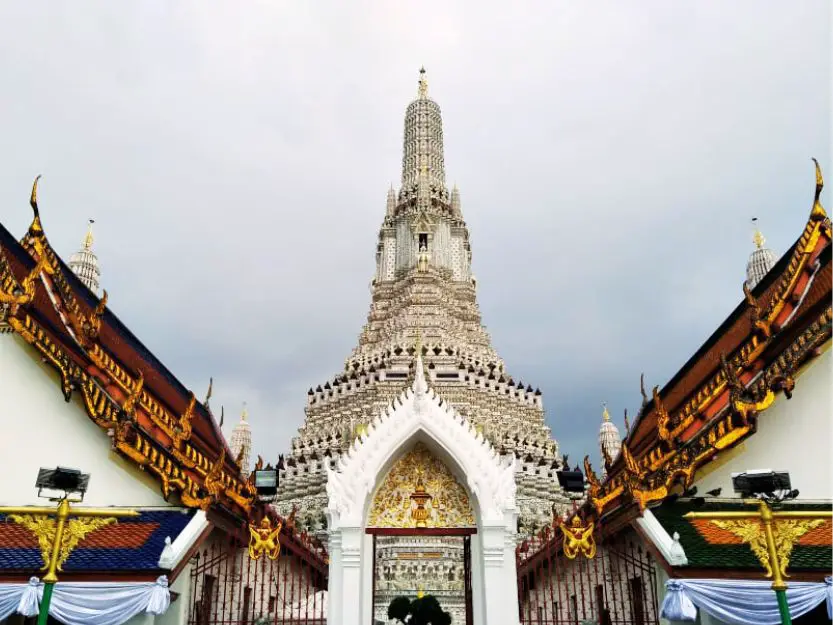 Ornate white and gold Wat Arun temple in Bangkok, Thailand