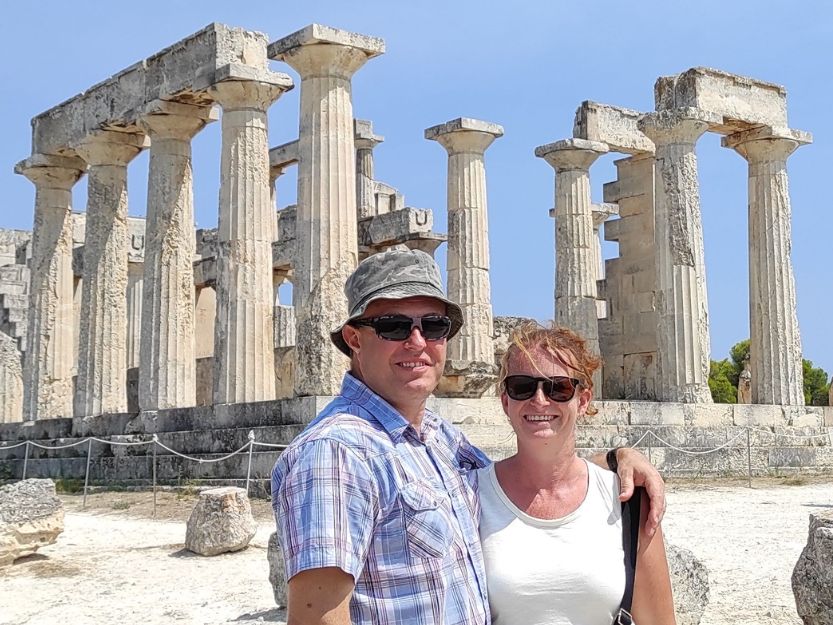 Work With Us Can Travel Will Travel Tanya and Andy in front of Temple of Aphaia on Aegina Island in Greece